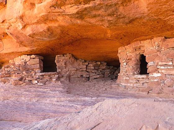 Two granaries beneath a ledge on the Aztec Butte trail.